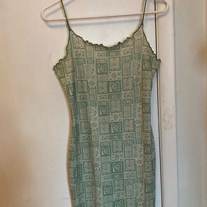 Green patterned bodycon dress